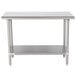 An Advance Tabco stainless steel work table with an undershelf.