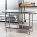 a stainless steel table in a kitchen