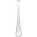 A close up of a Walco stainless steel serving spoon with a white background.