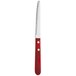 A Libbey stainless steel steak knife with a red pakkawood handle.