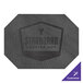 A customizable charcoal faux leather octagon placemat on a table with a logo on it.