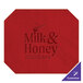 A red custom hardboard and faux leather octagon placemat with text on it.