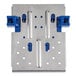A metal plate with blue handles and holes.