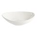 A close up of an Acopa Nova cream white bowl with a small rim.