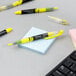 The tip of a Sharpie yellow highlighter pen.