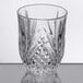 An Arcoroc Broadway shot glass with a diamond pattern.