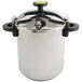 A Monix stainless steel pressure cooker with a lid.