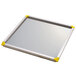 A stainless steel Matfer Mousse Sheet with yellow corners.