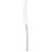 A close up of a Walco European table knife with a white handle.