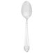 A Walco stainless steel teaspoon with a white handle.