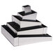 A silver Matfer Bourgeat stainless steel cake ring set on a black surface.