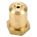 A close-up of a brass cylinder with a hole in it.