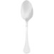 A Walco Soho stainless steel teaspoon with a white handle.