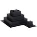 A black metal Matfer Bourgeat square wedding cake insert with a square top.