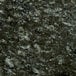 A close up of an Uba Tuba granite surface with black and white speckles.