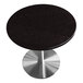 A black Art Marble Furniture table top with white specks on a silver base.