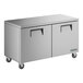 A silver stainless steel True undercounter freezer with black handles.
