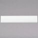 A white rectangular object with a grey background.