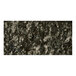 A close-up of an Uba Tuba granite table top with black and white speckles.