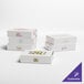 A group of white customizable bakery boxes with different text colors.