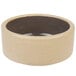A beige stoneware ramekin with a brown rim.