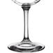 A clear wine glass with a stem.