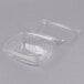 A Genpak clear plastic container with a lid.