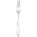 A close-up of a Walco Modernaire dinner fork with a white handle.