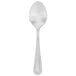 A Walco stainless steel demitasse spoon with a silver handle on a white background.