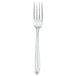 A silver Walco Continuo dinner fork with a white background.