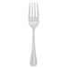 A silver Walco Napa salad fork with a white background.
