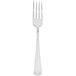 A Walco Classic silver table fork with a silver handle and four prongs.