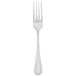 A silver Walco Napa dinner fork with a white background.