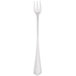 A silver Walco Classic cocktail fork with a white handle.
