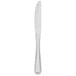 A close-up of a silver Walco Napa dinner knife.
