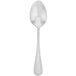 A silver Walco 18/10 stainless steel dessert spoon with a white handle.