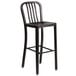 A Flash Furniture black metal outdoor bar height chair with a black seat and backrest.