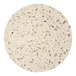 A close up of a white Art Marble Furniture round quartz tabletop with small holes.