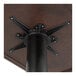 A black metal Lancaster Table & Seating table base with a black metal pole.