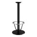 A Lancaster Table & Seating black cast iron bar height table base with a round foot ring.