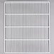 A white metal grid shelf with coated wire.