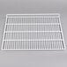 An Avantco white coated wire top shelf on a gray surface.