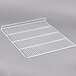A white coated wire top shelf for a deli, bakery, or display case.