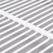 A white coated wire top shelf with holes.