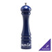 A cobalt blue pepper mill with white text reading "Autumn Hues"