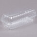 A clear Dart plastic hoagie container with a hinged lid.