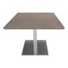 A square Art Marble Furniture table with a grey quartz top on a metal base.