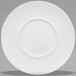 A Villeroy & Boch white bone porcelain flat plate with a round edge and a round center.