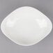 A white Villeroy & Boch Dune porcelain bowl on a gray background.