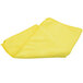 A yellow Unger SmartColor microfiber cloth folded on a white surface.